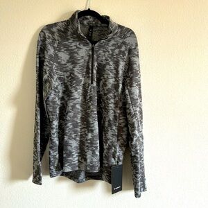 Lululemon. Surge warm half zip. Size L